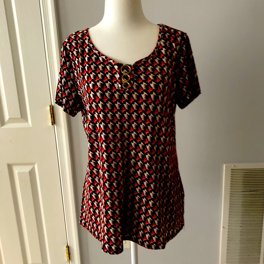 By design short sleeve top. Size M